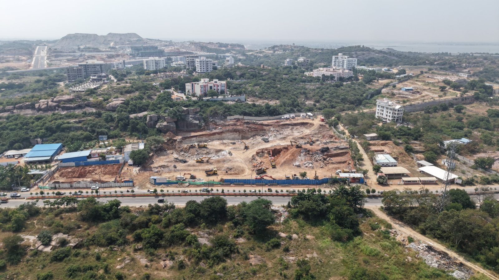 Wide aerial of the site's road frontage