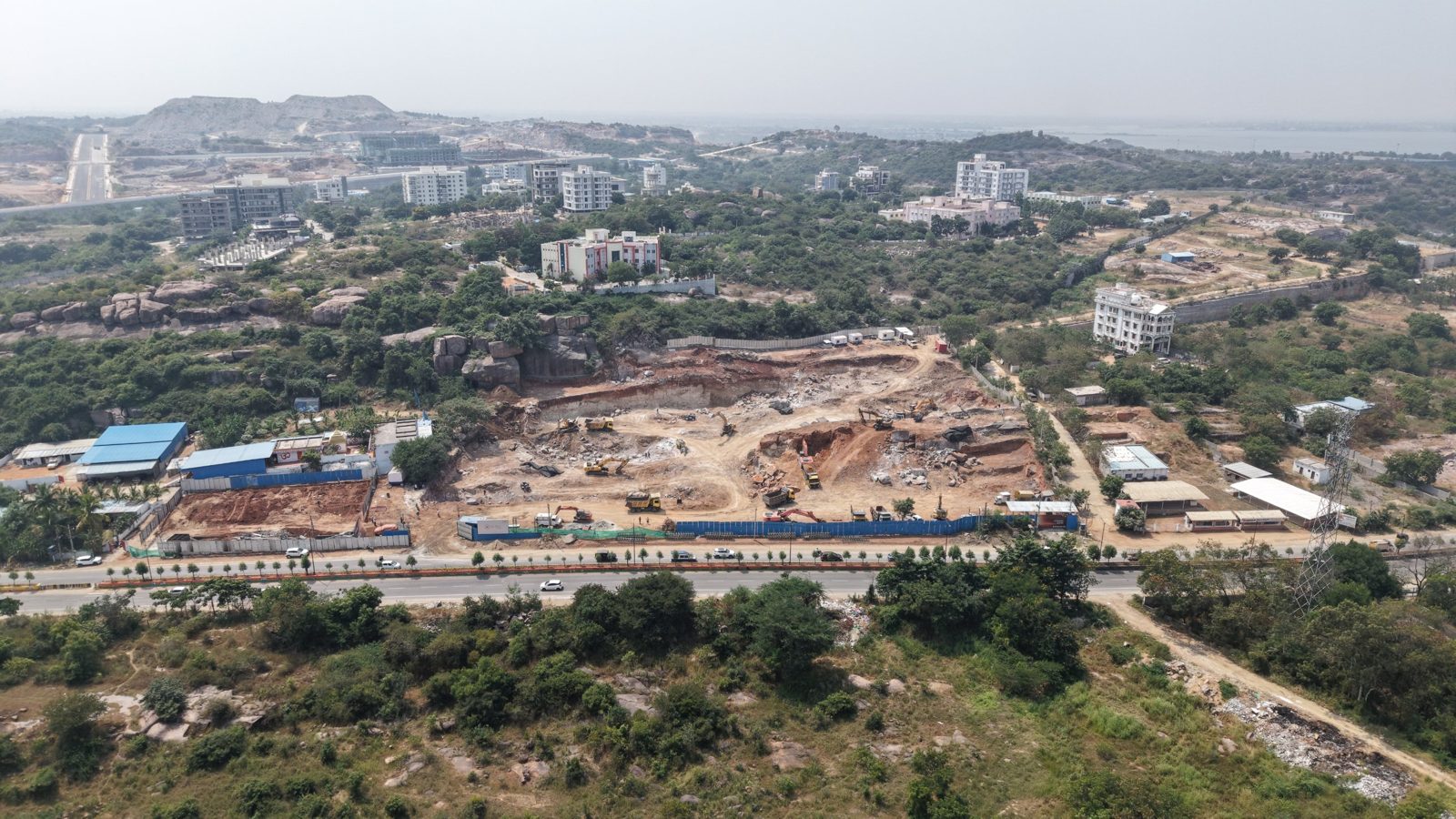 Second wide aerial of the frontage and surrounding hills