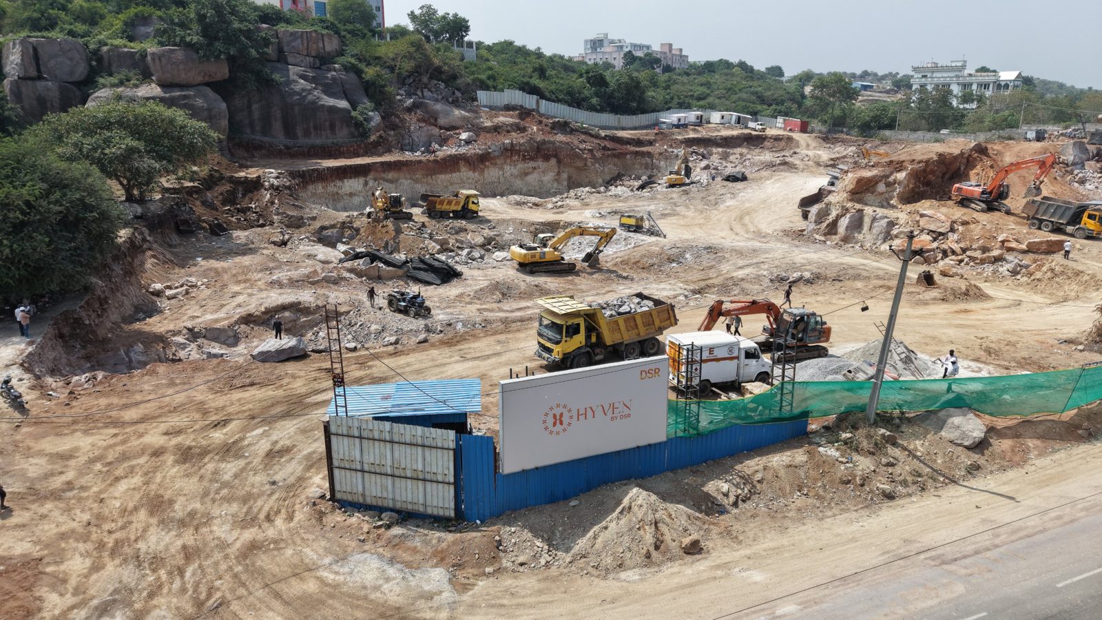 HYVEN by DSR site hoarding with excavation behind