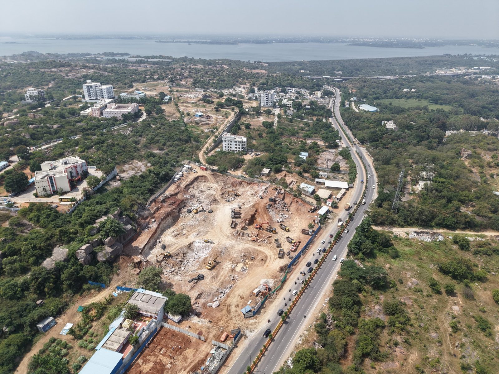 Aerial view of the site with the lake on the horizon