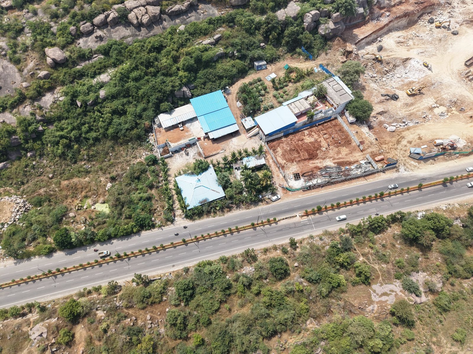 Aerial of the neighbourhood and boulder hill next to the site